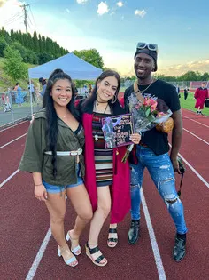 McKenzie Shaffer, center, 1st Ernie Davis Fashion Club student graduate since 2021 relaunc